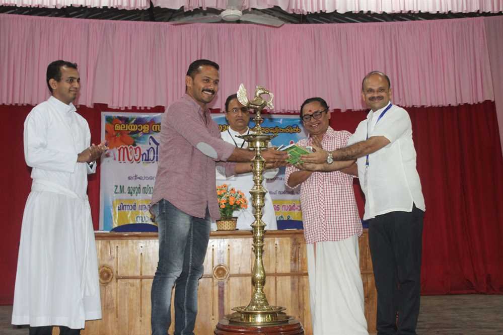 Fr. Z M Moozhoor Anusmarana Prabhashanam and Donation of 1001 Books to Chinnar Tribal Settlement